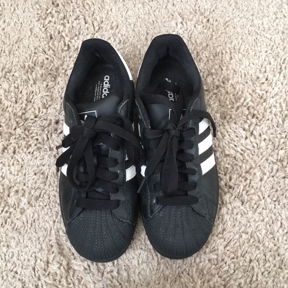 Black and white adidas super star